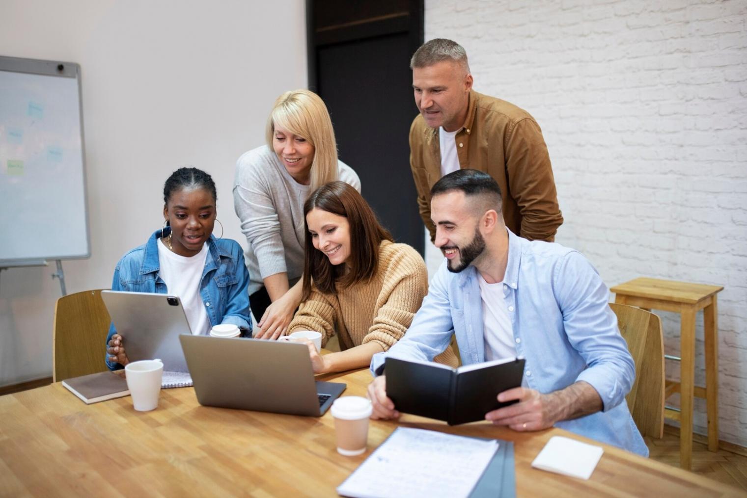 Professional analyzing financial data and investment reports on multiple monitors
